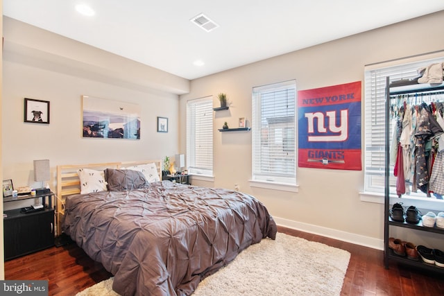 bedroom featuring dark hardwood / wood-style floors