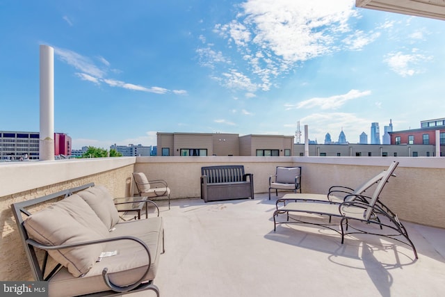 view of patio / terrace with a balcony