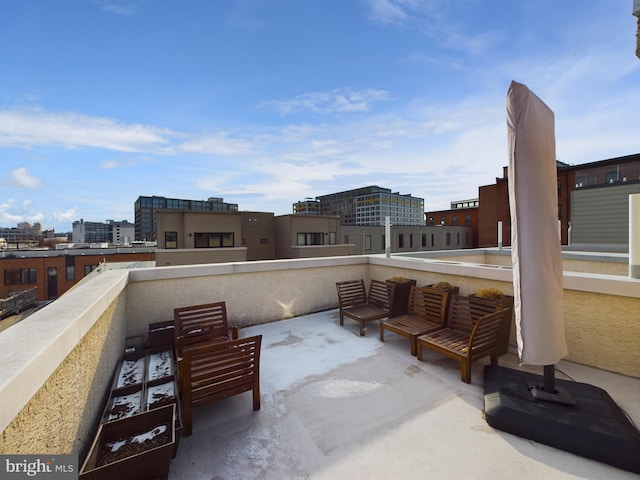 view of patio / terrace with an outdoor living space and a balcony