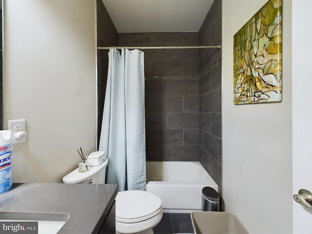 full bathroom featuring tile patterned flooring, shower / bath combination with curtain, vanity, and toilet