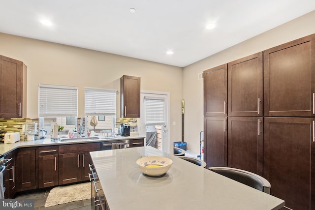 kitchen with decorative backsplash and sink