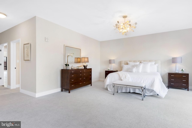 bedroom with carpet flooring, baseboards, and an inviting chandelier