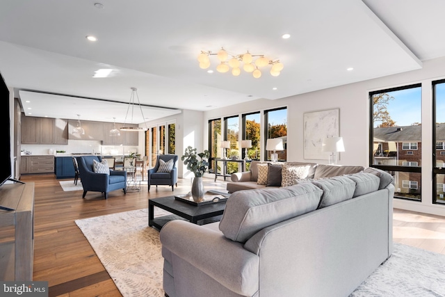 living room featuring wood finished floors and recessed lighting