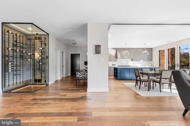 interior space with light wood-type flooring and baseboards