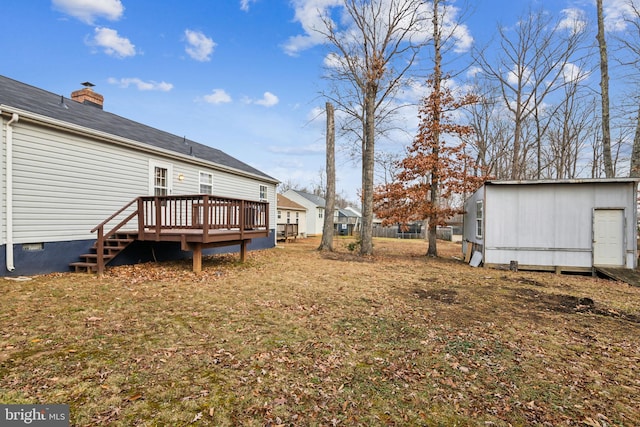 view of yard with a deck