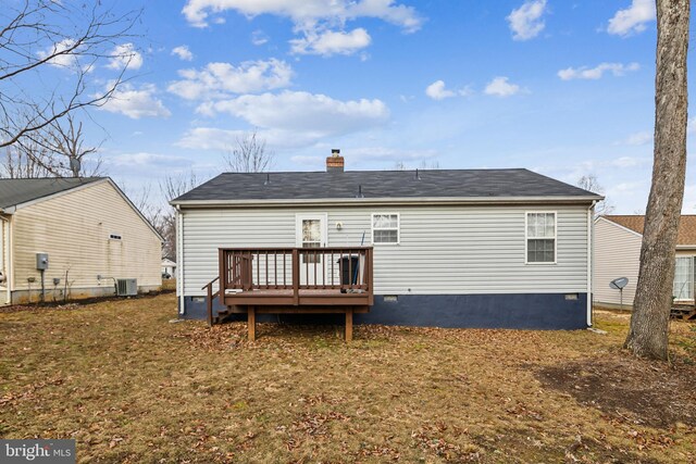 back of house featuring a wooden deck and central AC