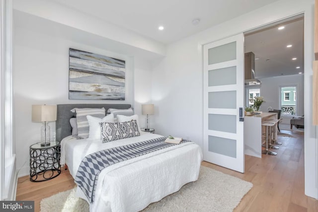 bedroom featuring light wood-type flooring