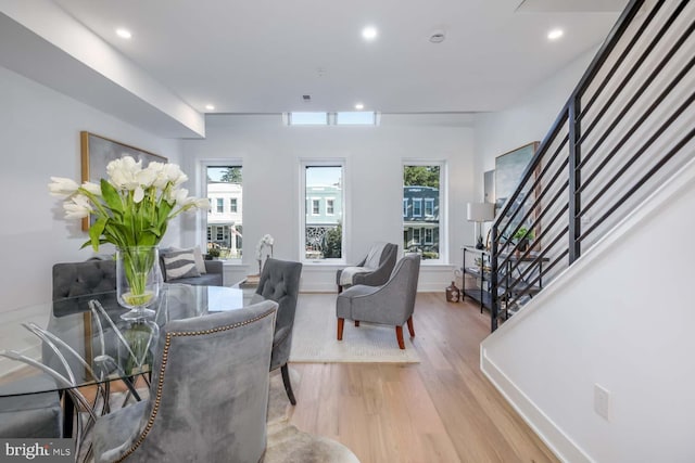 living room with light hardwood / wood-style floors