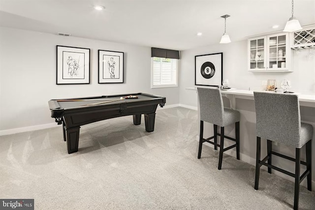 playroom with bar area, light colored carpet, and pool table