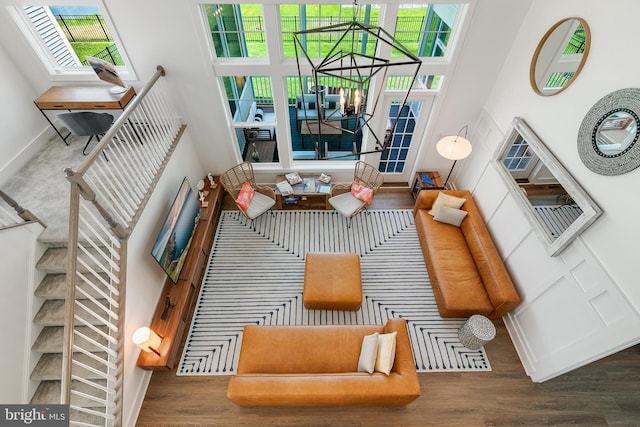 interior space with a healthy amount of sunlight and a high ceiling