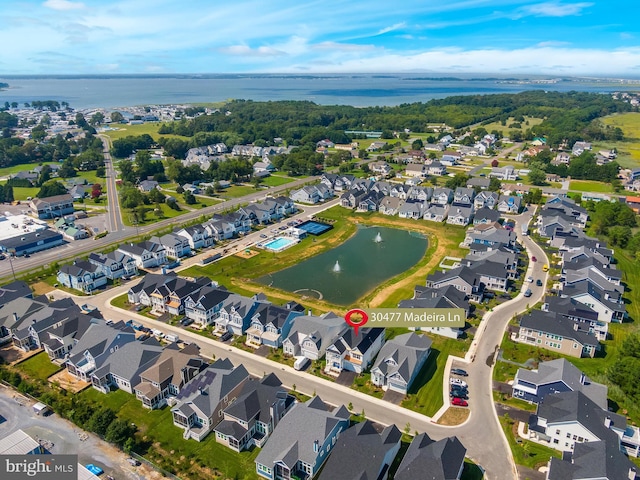 bird's eye view with a water view