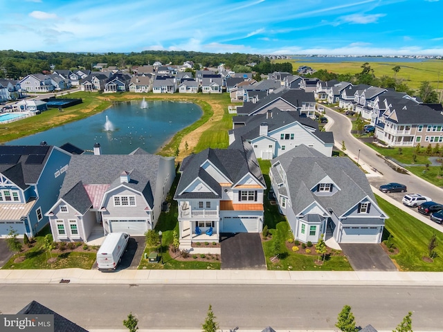 drone / aerial view featuring a water view