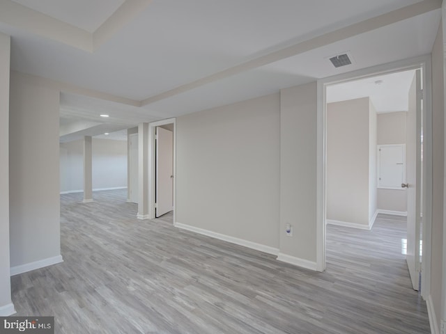 unfurnished room featuring light wood-type flooring