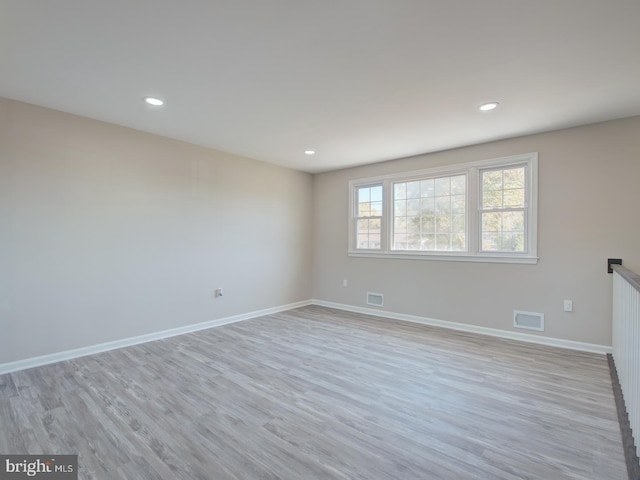 empty room featuring light hardwood / wood-style flooring