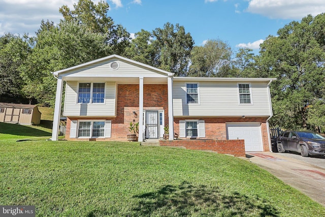 raised ranch with a garage and a front lawn