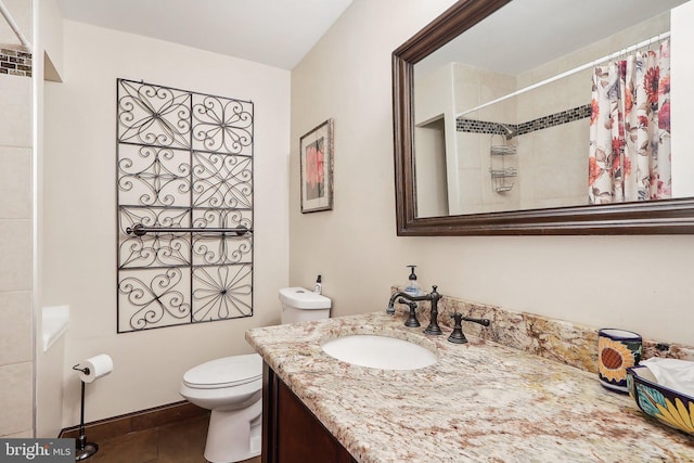 bathroom with toilet, vanity, tile patterned flooring, and curtained shower