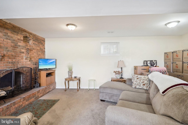 living room with a brick fireplace and light carpet