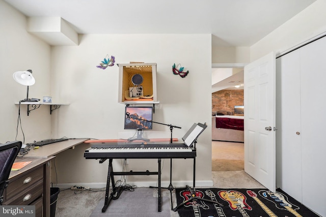 office area featuring light colored carpet