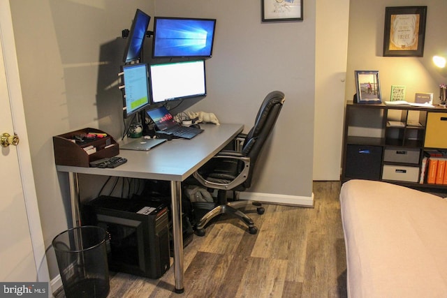 office area with wood-type flooring