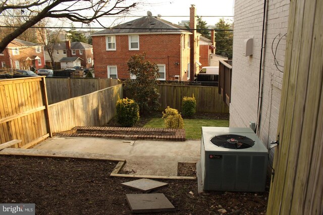 view of yard featuring central air condition unit