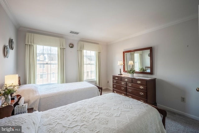 carpeted bedroom with crown molding