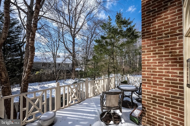 view of snow covered deck