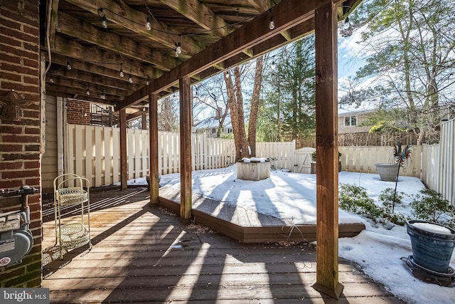 view of snow covered deck