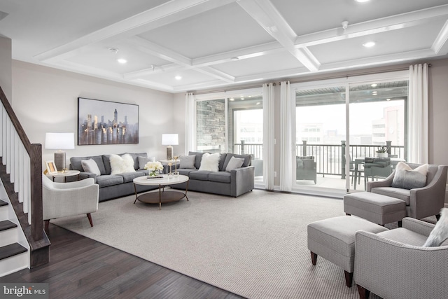 living room with beamed ceiling, hardwood / wood-style flooring, and coffered ceiling