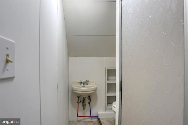 bathroom featuring toilet