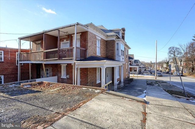 exterior space featuring a balcony