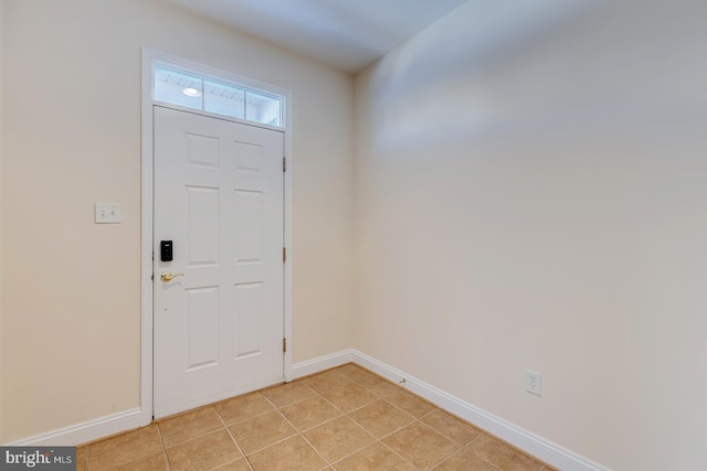 view of tiled foyer entrance