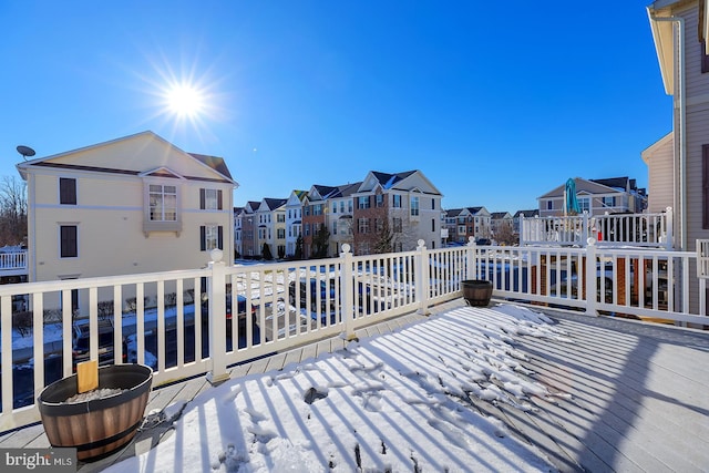 view of snow covered deck