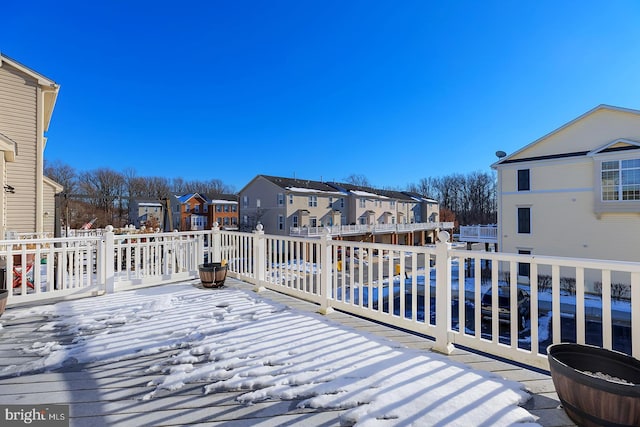 view of snow covered deck