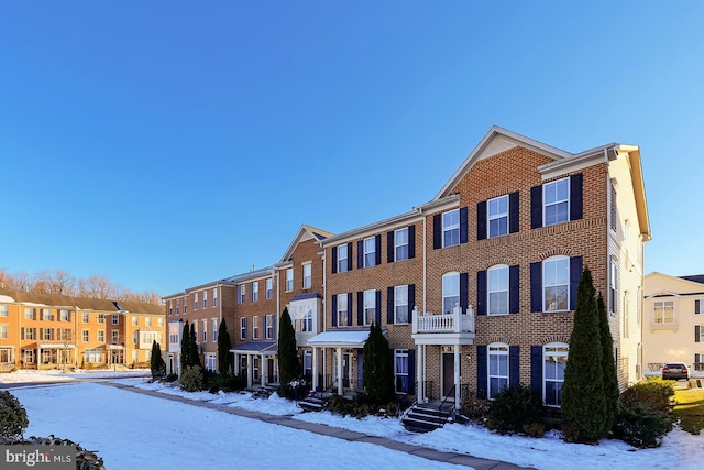 view of snow covered property