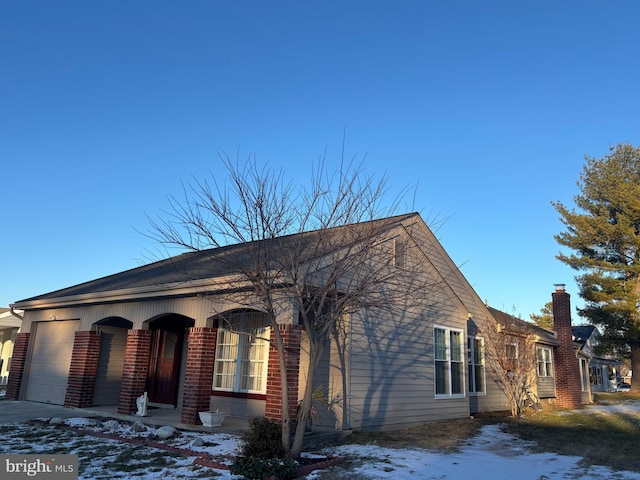 view of front of home with a garage