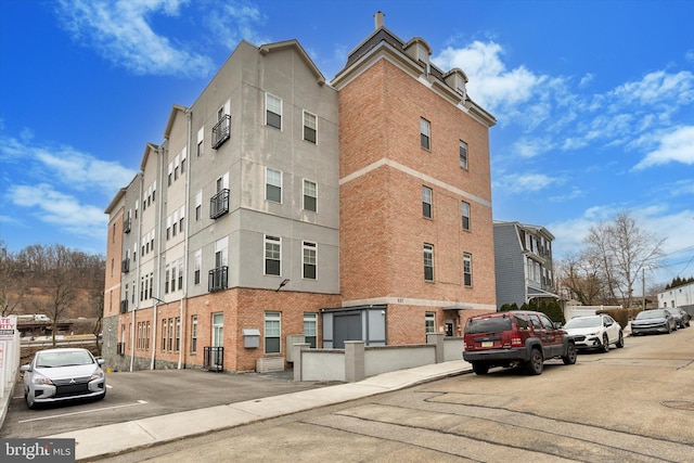 view of building exterior featuring central AC unit