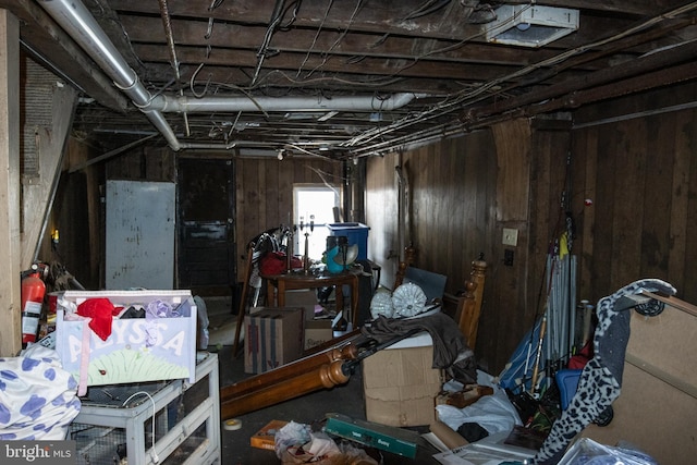 interior space featuring wood walls