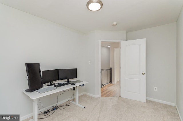 office featuring light carpet