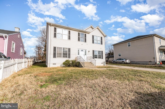 view of front of house with a front lawn