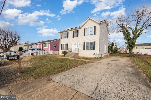 view of front of property with a front lawn