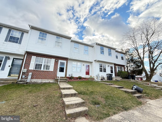 view of property featuring a front yard