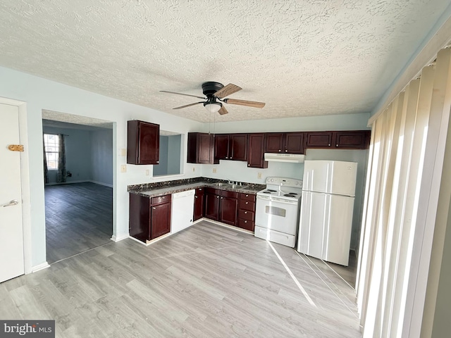 kitchen with ceiling fan, sink, light hardwood / wood-style flooring, a textured ceiling, and white appliances