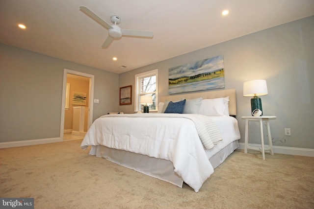 carpeted bedroom featuring ceiling fan