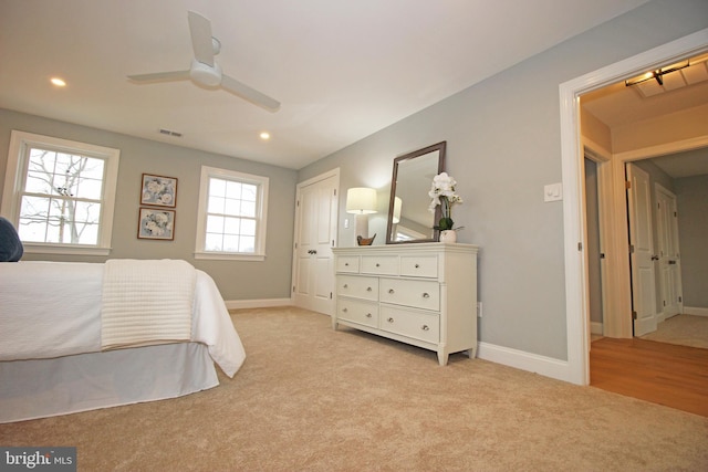 carpeted bedroom featuring ceiling fan