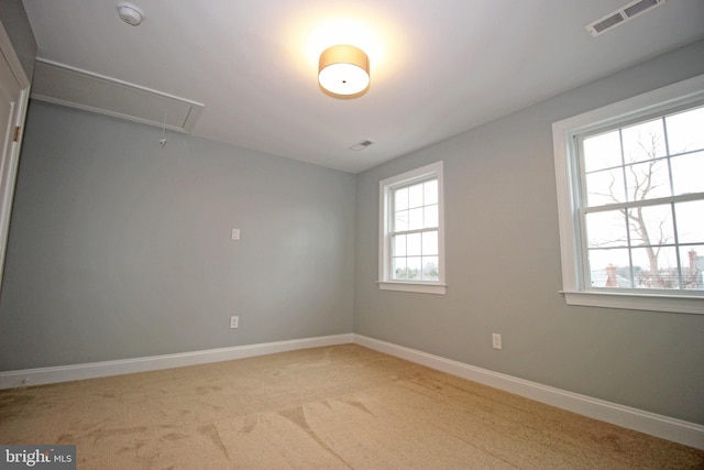 view of carpeted spare room