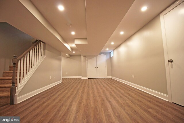 basement with wood-type flooring