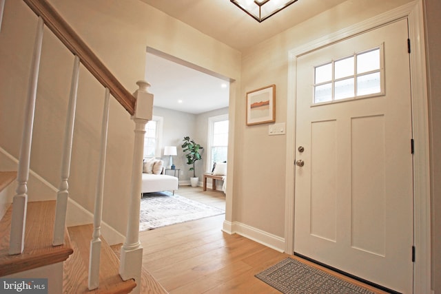 entrance foyer with light wood-type flooring