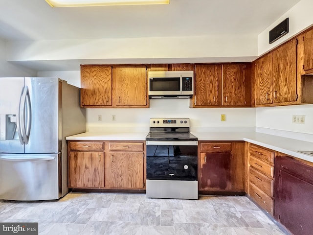 kitchen with appliances with stainless steel finishes