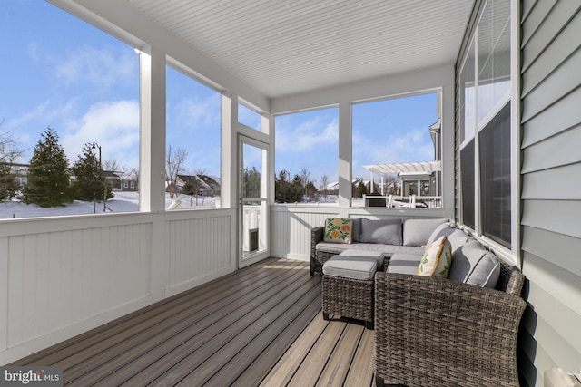 sunroom with plenty of natural light