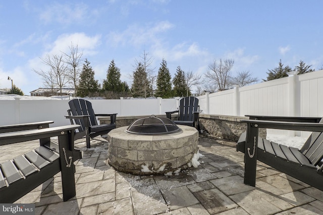 view of patio / terrace featuring a fire pit